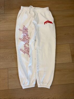 White Kids Joggers with Pink Script and Red Accent